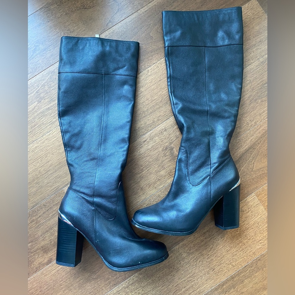 New White House Black Market size 8 black boot with silver accent above heel